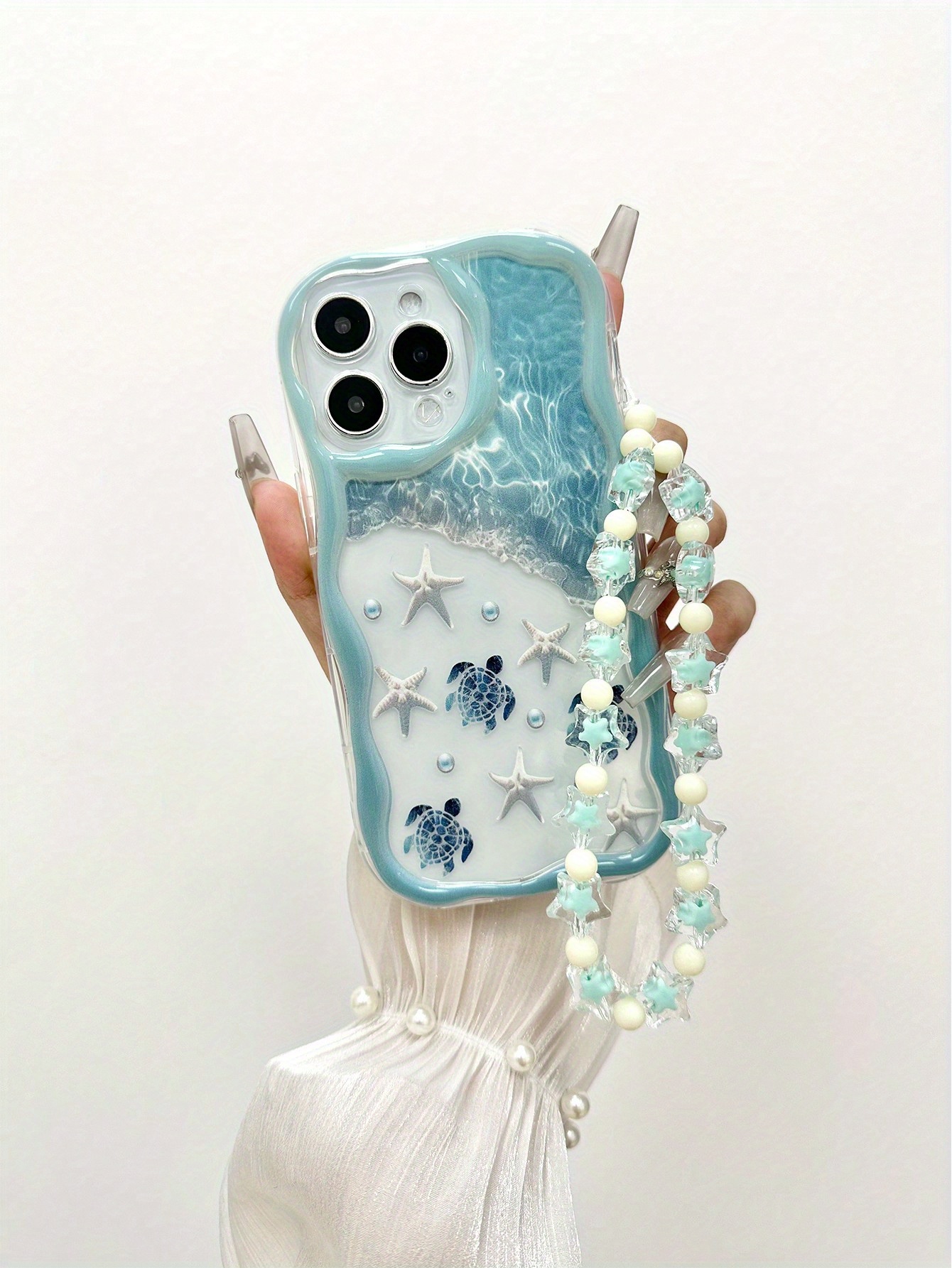 Beach Starfish And Sea Turtle Pattern Wave Gradient Painting Shockproof Phone Case with Handmade Beaded Bracelet, Compatible with Iphone 16, 15, 14, 13, 12 And 11 Pro Models, Made of TPU Protective Material. Ideal Choice for Family, Friends, Young People, Birthdays, Festivals, Boyfriends, Girlfriends And Valentine'S Day Gifts