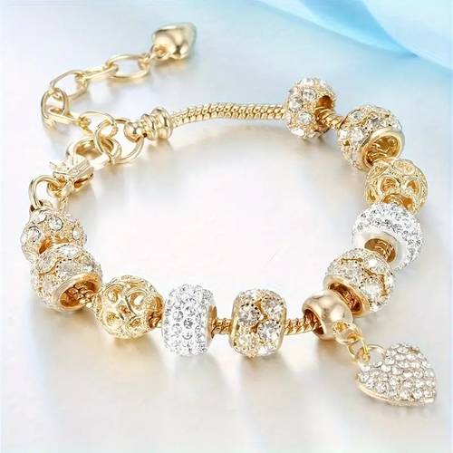 elegant bracelet for women with glass beads and heart shaped pendants a party and holiday accessory