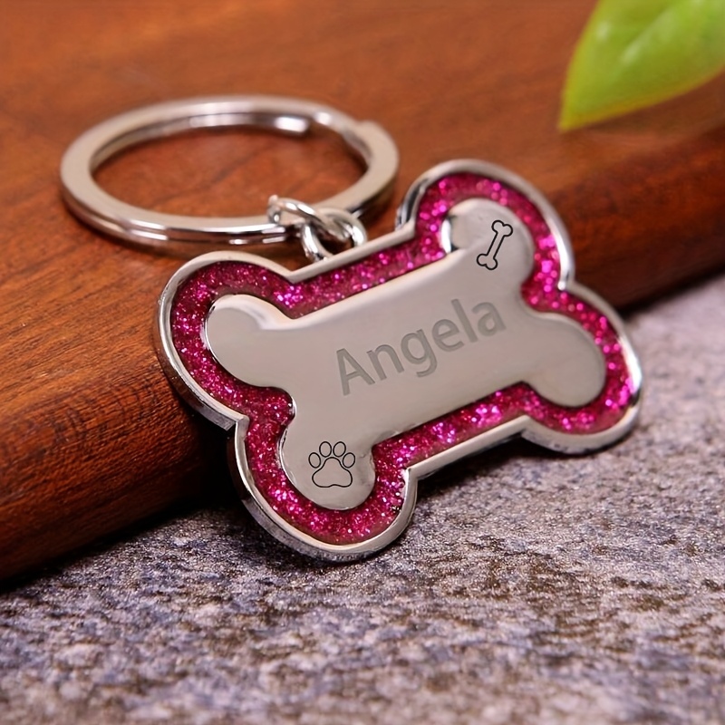 TEMU This Customizable Double-sided Pet Id Tag, Shaped Like A Bone, Features A Sparkling Paw Print Design, Engravable With Your Pet's Name, Phone