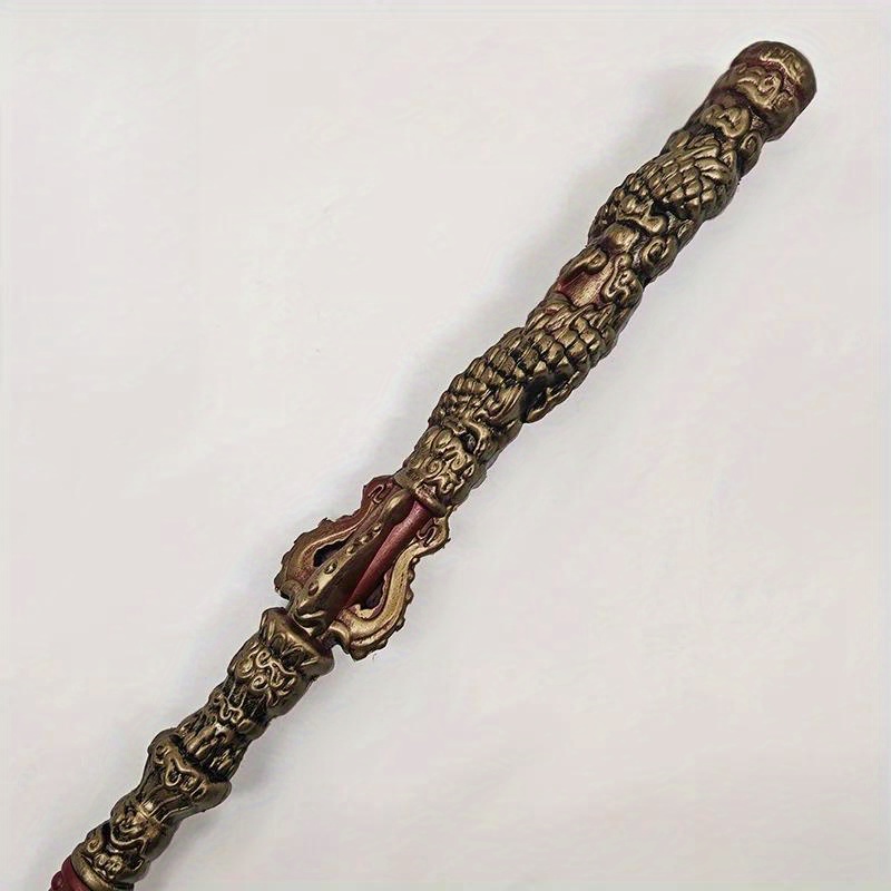 A Sun Wukong Stick with intricate designs on a white background