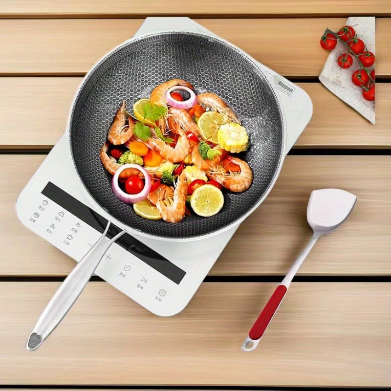 versatile stainless steel honeycomb wok with non stick coating     use compatible with induction cooktops ideal for   camping details 0