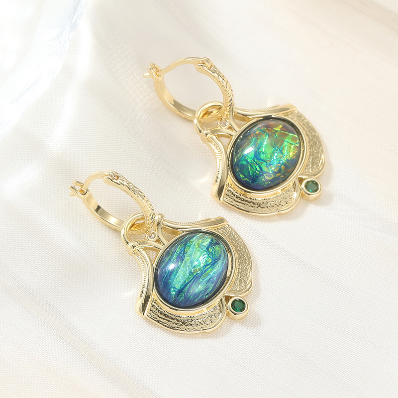 Chic Leaf-Patterned Earrings with Synthetic Blue-Green Opal Accents