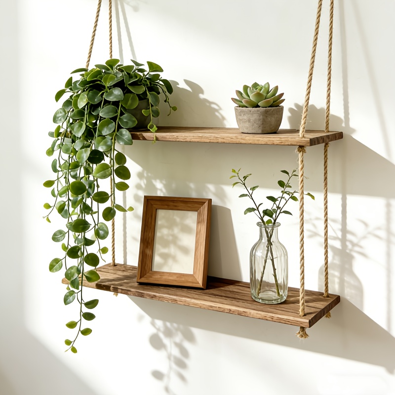 a wooden double layer wall shelf in a bohemian style   with   rope ideal for storing plants in living rooms and bedrooms this instagram   decorative wall shelf is a hand  hanging rack that     minimalist home de