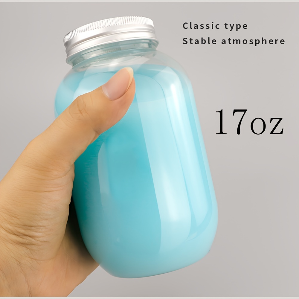Estilo Dairy Reusable Glass Milk Bottles with Metal Lids, 33.8 Oz., Set of  4. 