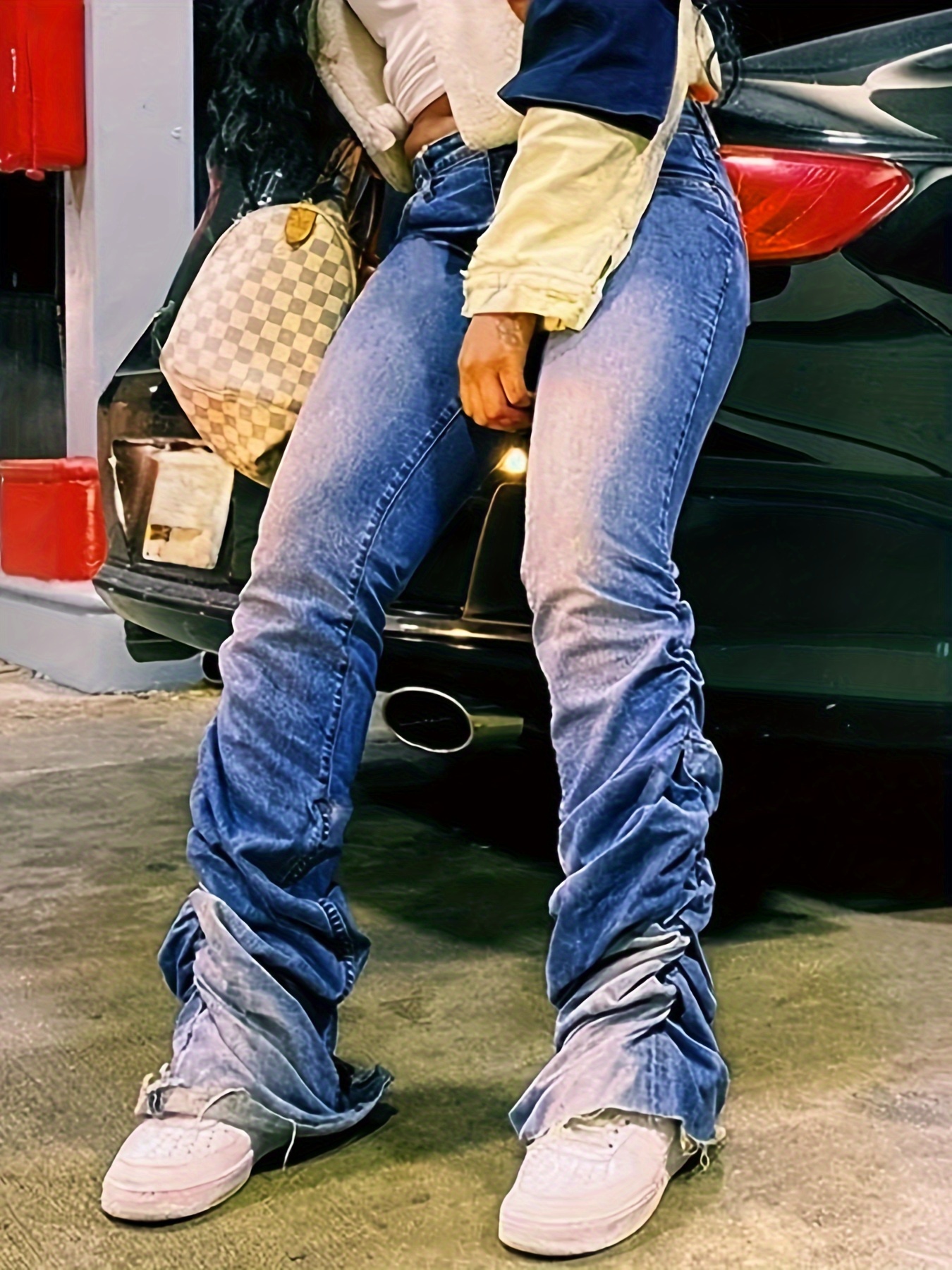 Jeans ajustados con bolsillo lateral con solapa apilado 