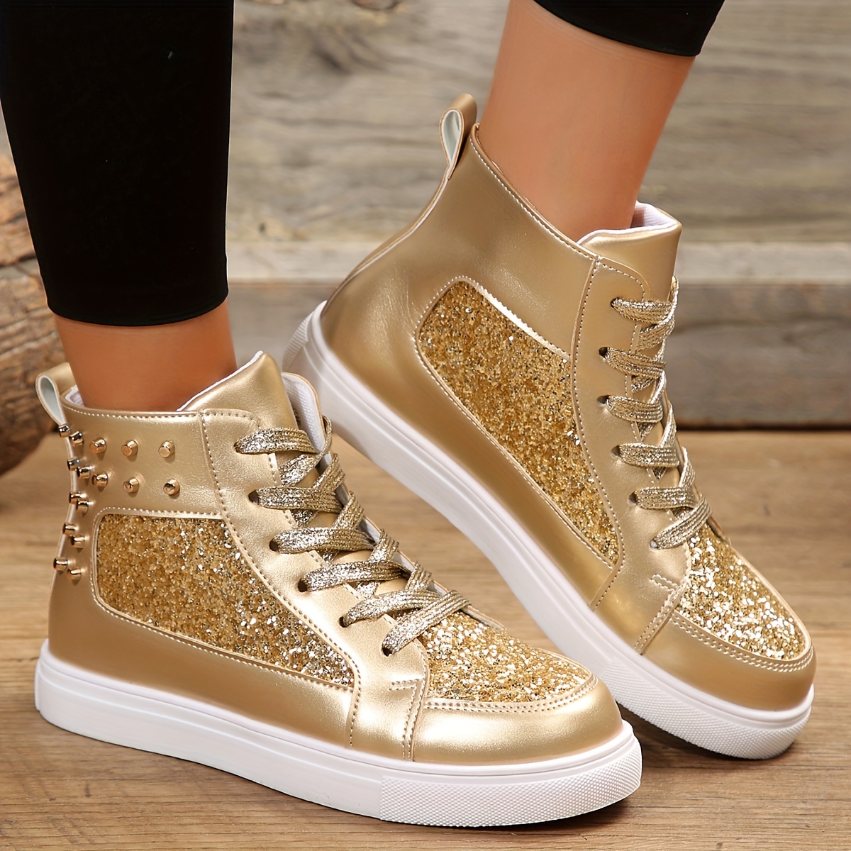 Gold high top store sneakers womens