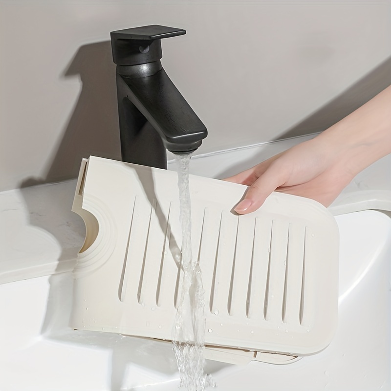 https://img.kwcdn.com/product/silicone-faucet-handle-drip-catcher-tray-mat/d69d2f15w98k18-efe84c5a/Fancyalgo/VirtualModelMatting/f2a4196f5bc097e8182e57e36f3baa91.jpg?imageMogr2/auto-orient%7CimageView2/2/w/800/q/70/format/webp