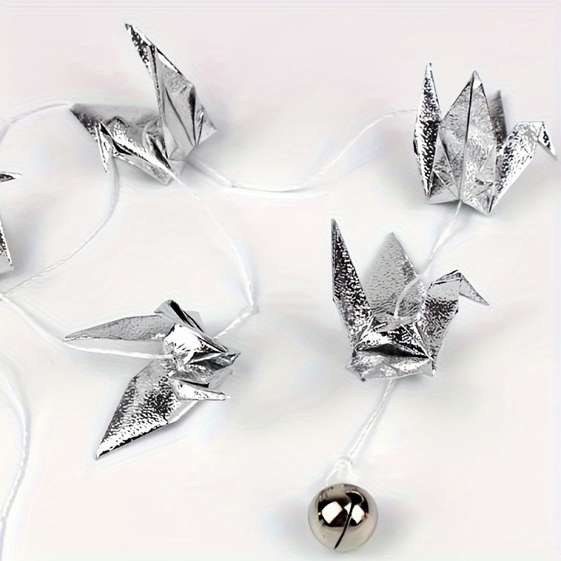 https://img.kwcdn.com/product/silvery-paper-crane-latte-flower-decoration/d69d2f15w98k18-78ca1746/Fancyalgo/VirtualModelMatting/13051f81c8d2ecddfdd87ea8f807a3f7.jpg?imageView2/2/w/500/q/60/format/webp