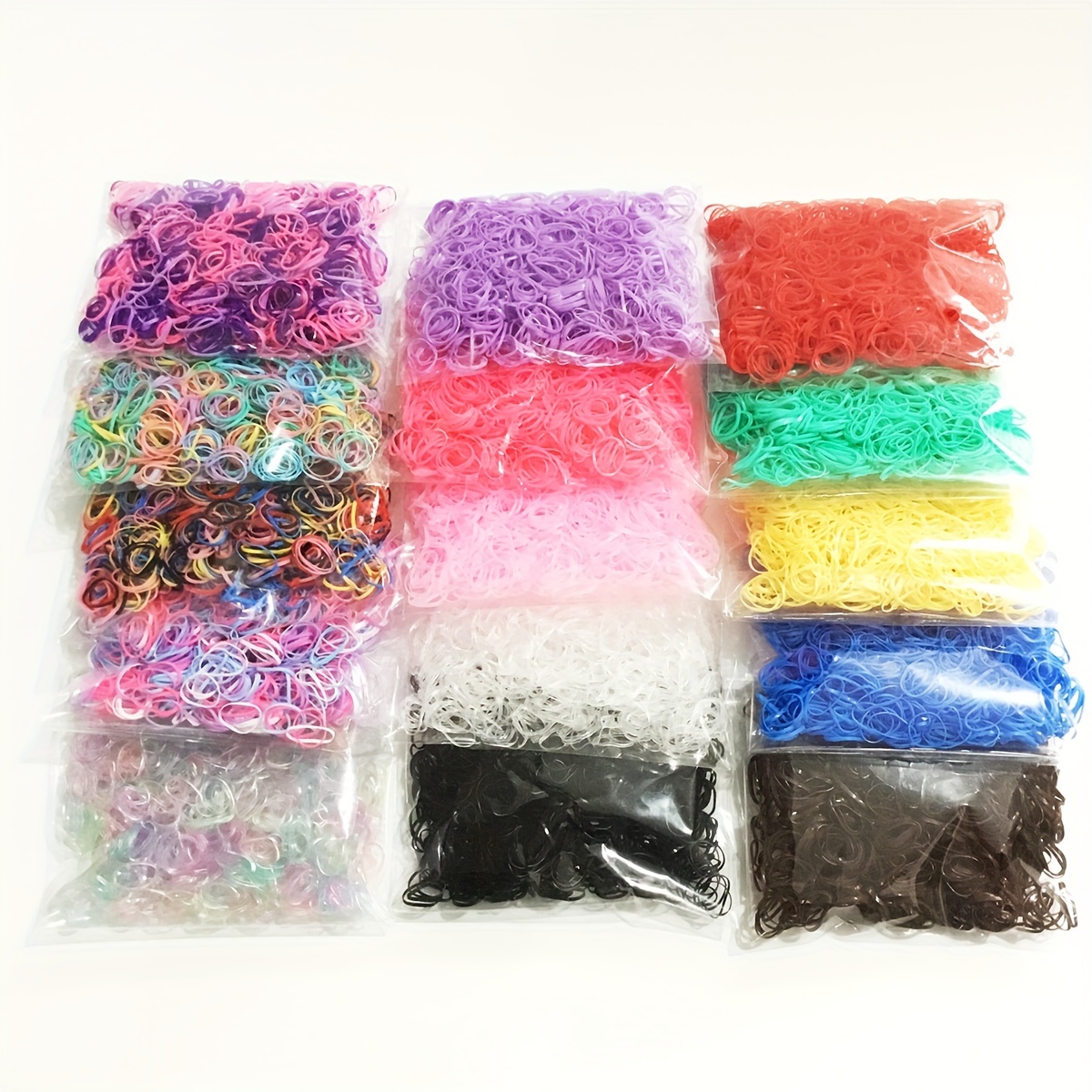 Gomitas pelo elásticas silicona multicolor 500 uds