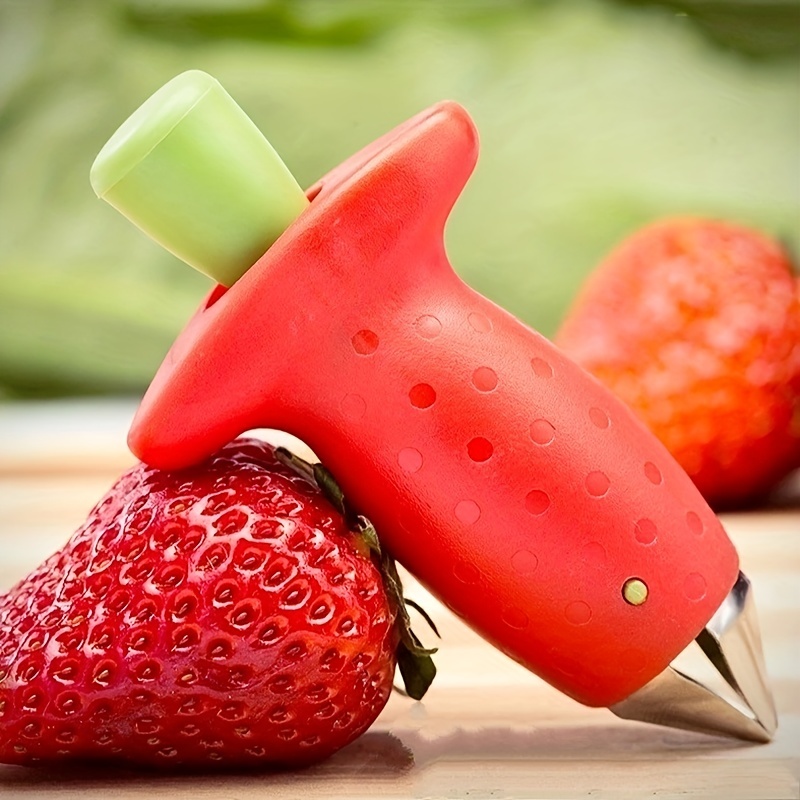 De-stem strawberries with the metal strawberry huller