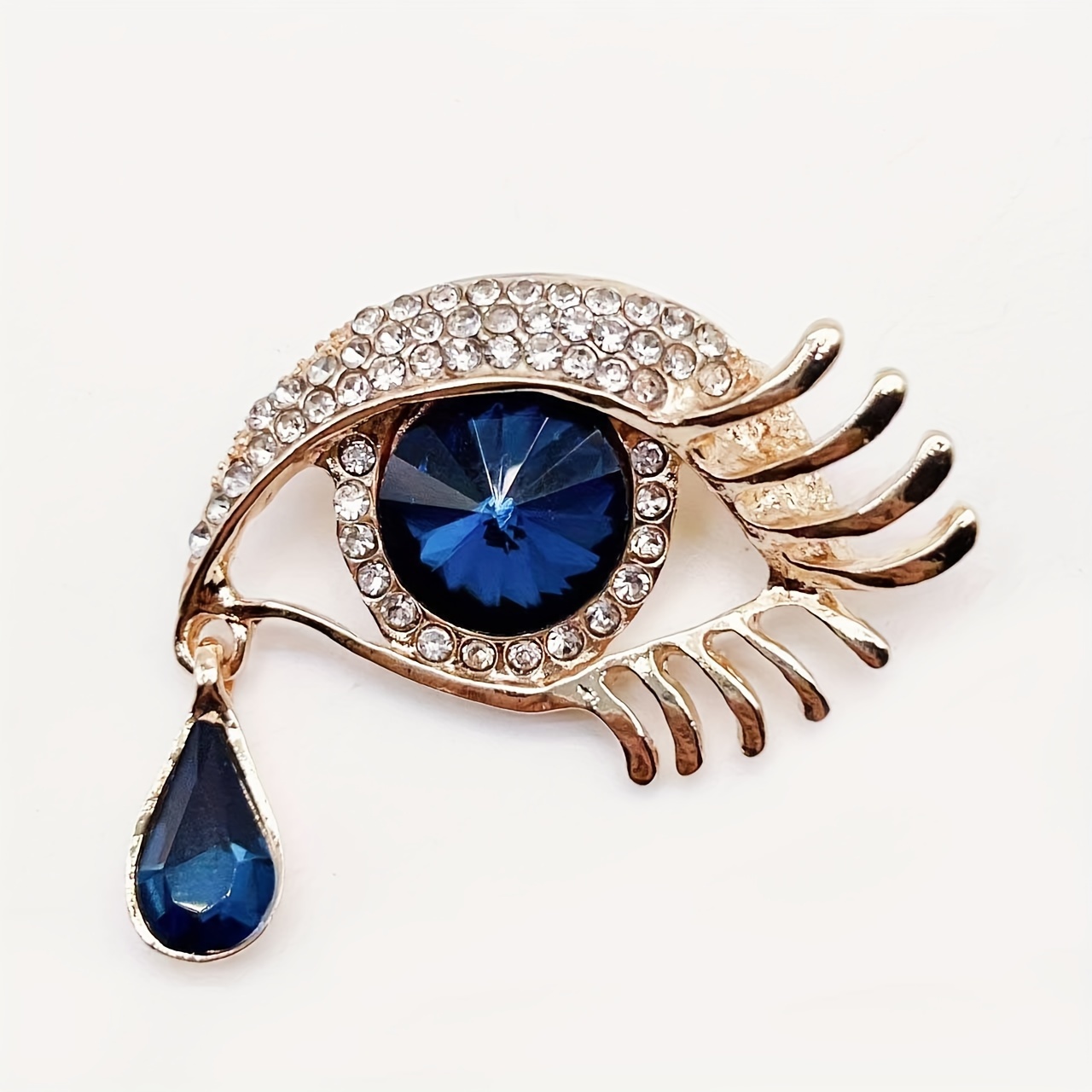 Eye brooch deals