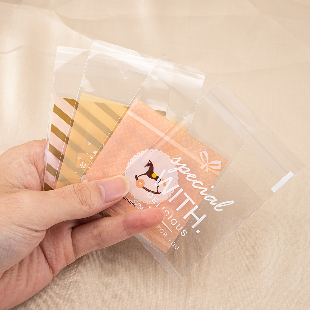  Bolsas 100pcs 10 Tamaños Disponibles Bolsas de Plástico  Transparente para Galletas de Caramelo Embalaje Celofán Bolsa de Celofán  Recuerdos de Fiesta de Boda - (Color: 10X15CM) : Hogar y Cocina