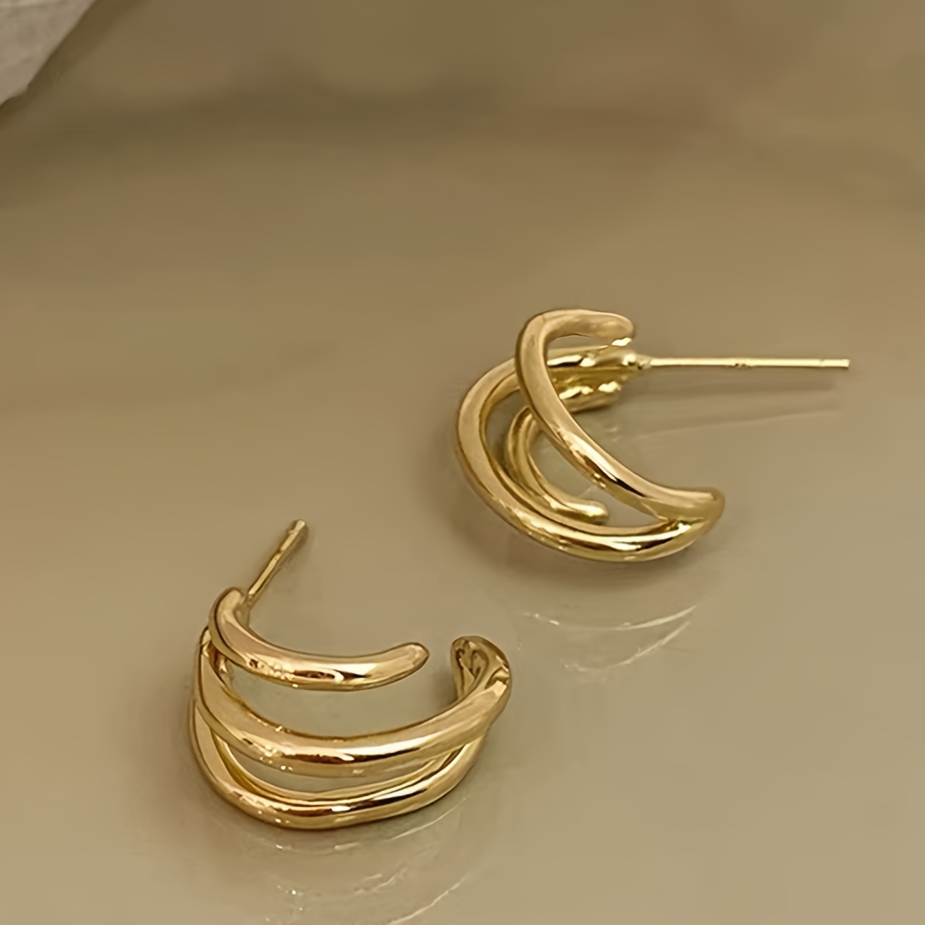 Simple gold ear on sale tops