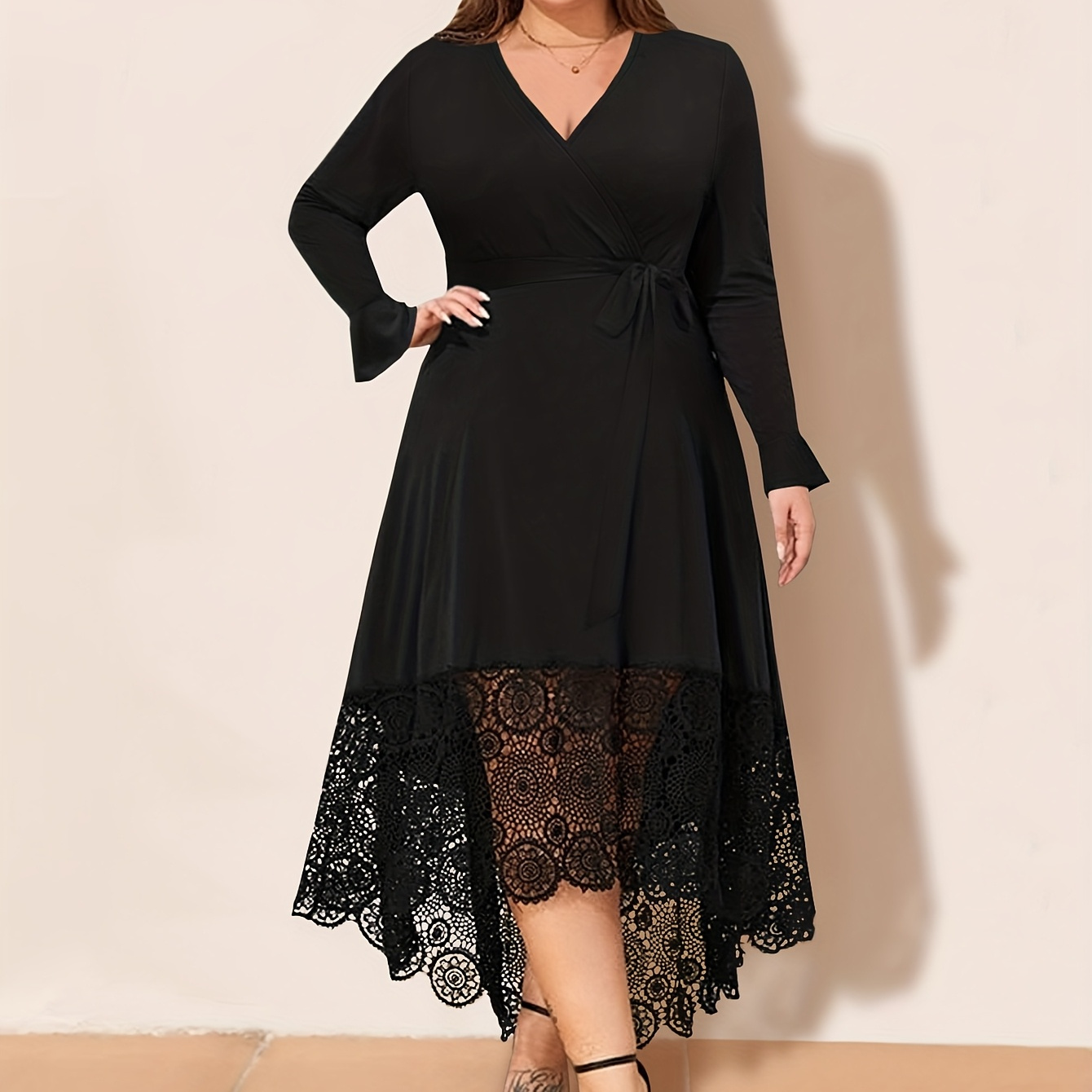 

An Elegant Solid Color Dress With A Collar, Lace Trim, A Tied Waist, And Long Sleeves, Designed For Plus-size Women.