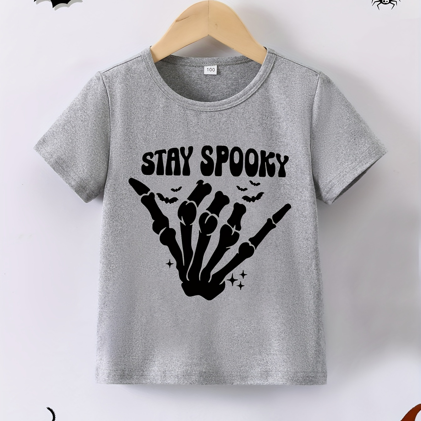 

Stay Spooky Letter Skeleton Hand Graphic Print Girl's Crew Neck Short Sleeve T-shirt, Trendy Tees, Casual Comfortable Versatile Top For Summer