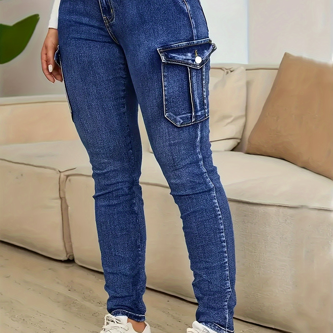 

High-waisted Slim-fit Cargo Pants With Stretchy Pockets That The Hips And Create A Tall, Silhouette.