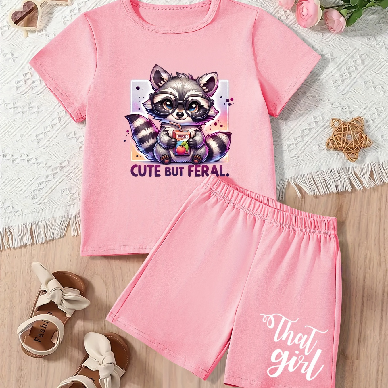 

Girls Trendy 2pcs, Cartoon Raccoon Graphic & Cute But Feral Print Crew Neck Short Sleeve T-shirt + Shorts Set, Casual And Comfy Summer Clothes