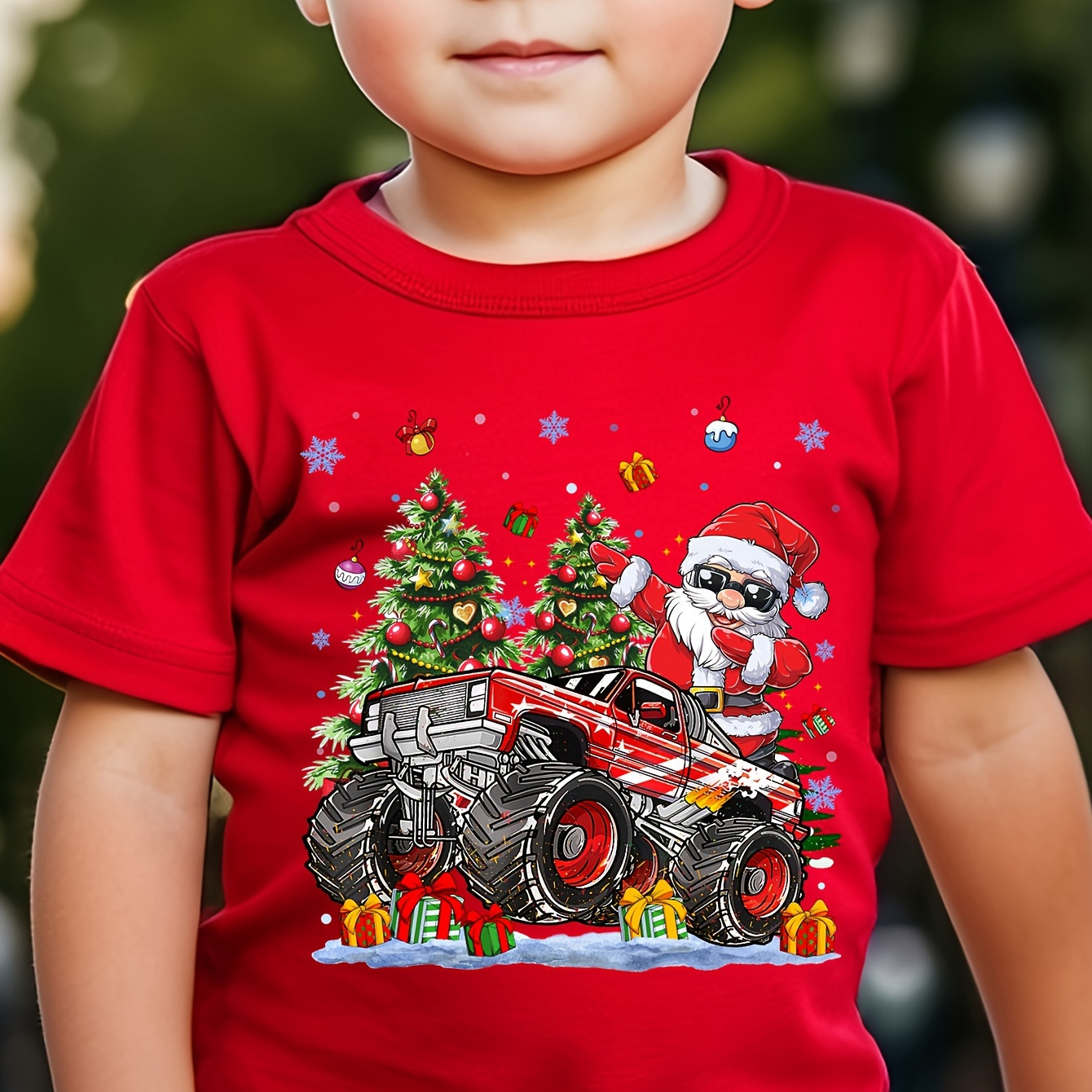 

Festive Christmas T-shirt: Santa In A Monster Truck - Kids' Casual Wear - Red With Christmas Trees And Presents - Perfect For The Holidays