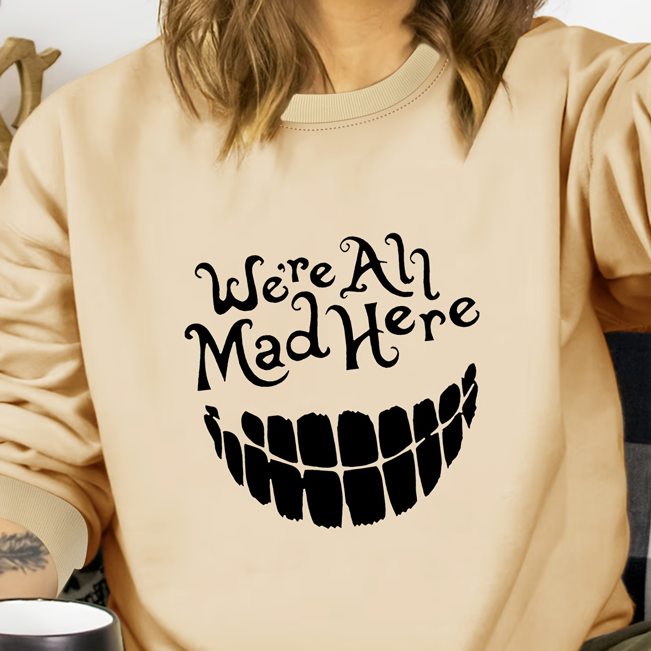 

Plus Size We're All Mad Here Print Pullover Sweatshirt, Casual Long Sleeve Crew Neck Sweatshirt For Fall & Winter, Women's Plus Size Clothing