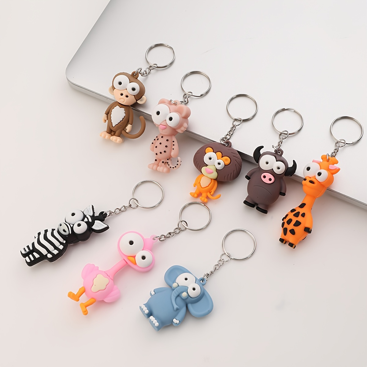 

8pcs Big Eye Animal Keychain Creative Pvc Elephant Monkey Cow Deer Pendant Fashion Bag Key Accessories Key Chain
