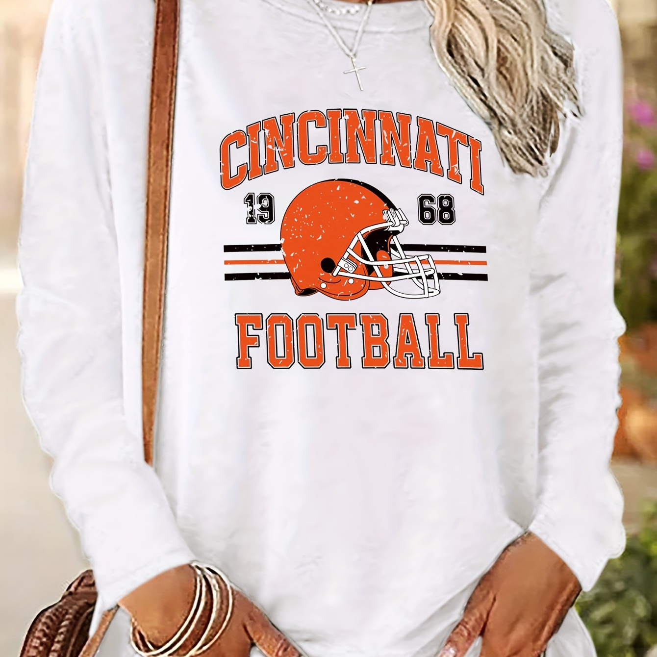 

Football Graphic Women's Long Sleeve T-shirt, Polyester 100% Knit Fabric, Casual Crew Neck Pullover With Applique Detail And Medium Stretch, Regular Fit For Spring/fall