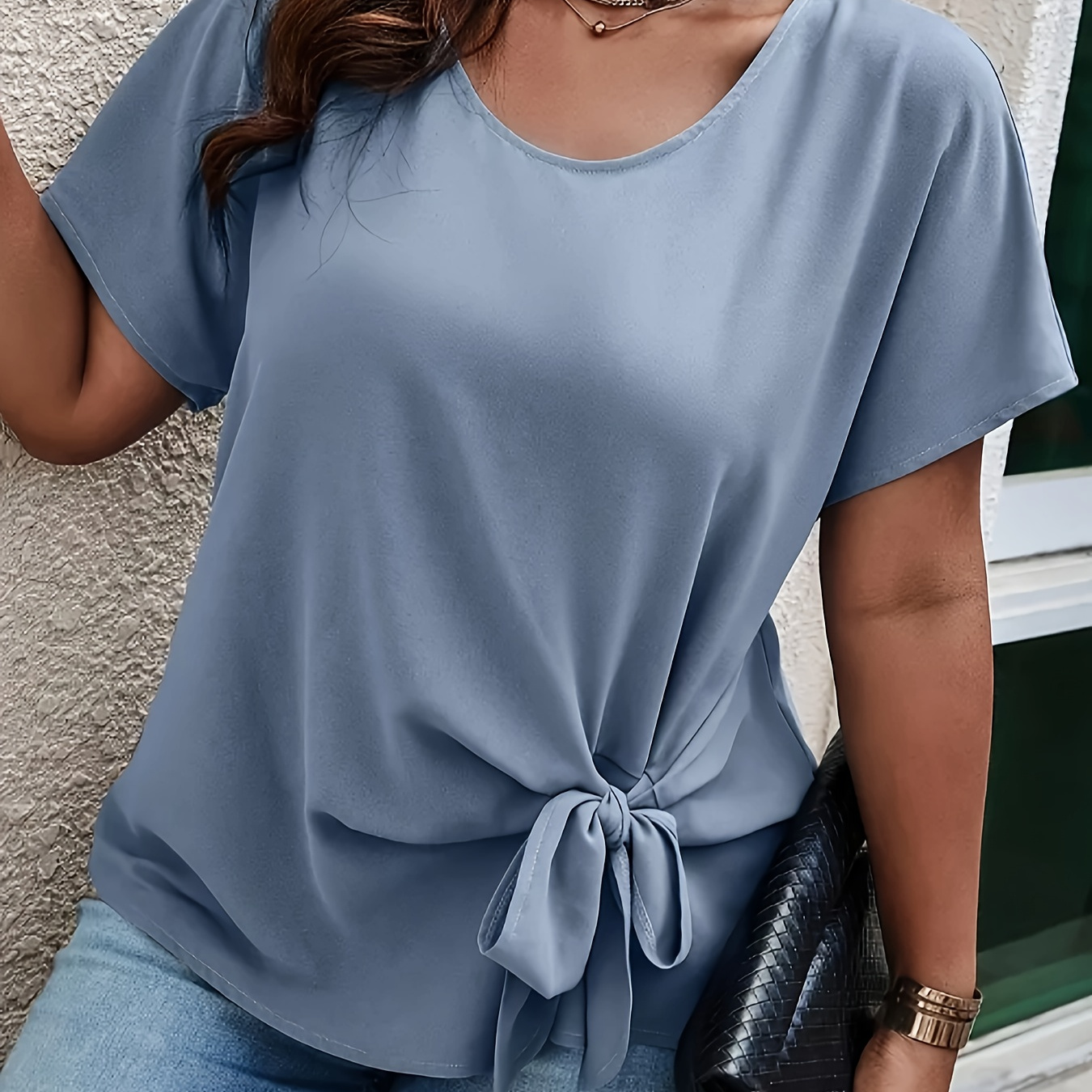 

Popular Extended Solid Color Hem Bow Top