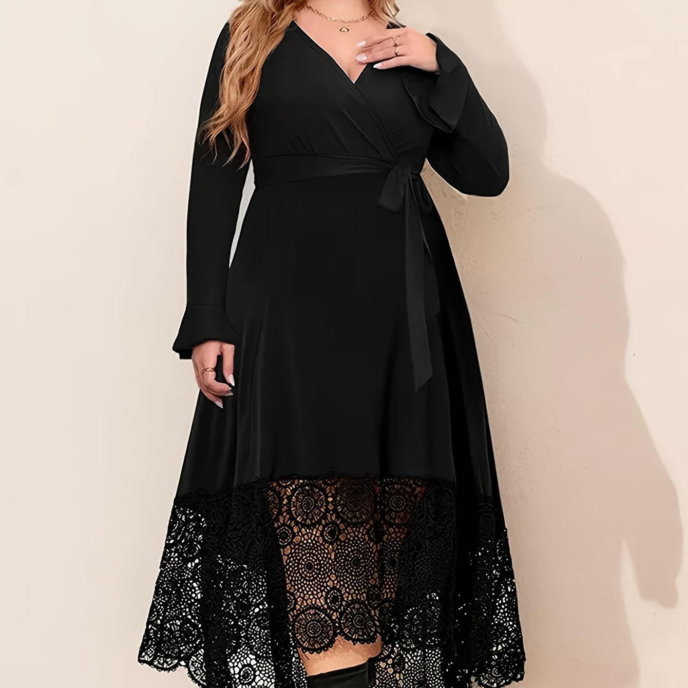 

An Elegant Solid Color Dress With A Collar, Lace Trim, A Tied Waist, And Long Sleeves, For Plus-size Women.