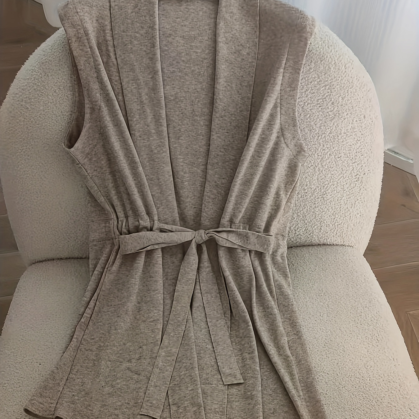 

Women's Casual Sleeveless Knit Cardigan - Solid Color Polyester And Rayon Blend, Regular Fit, Medium Stretch, Hem Detail, Belted Lapel Collar, Design, For Spring/fall Weekend Casual Wear