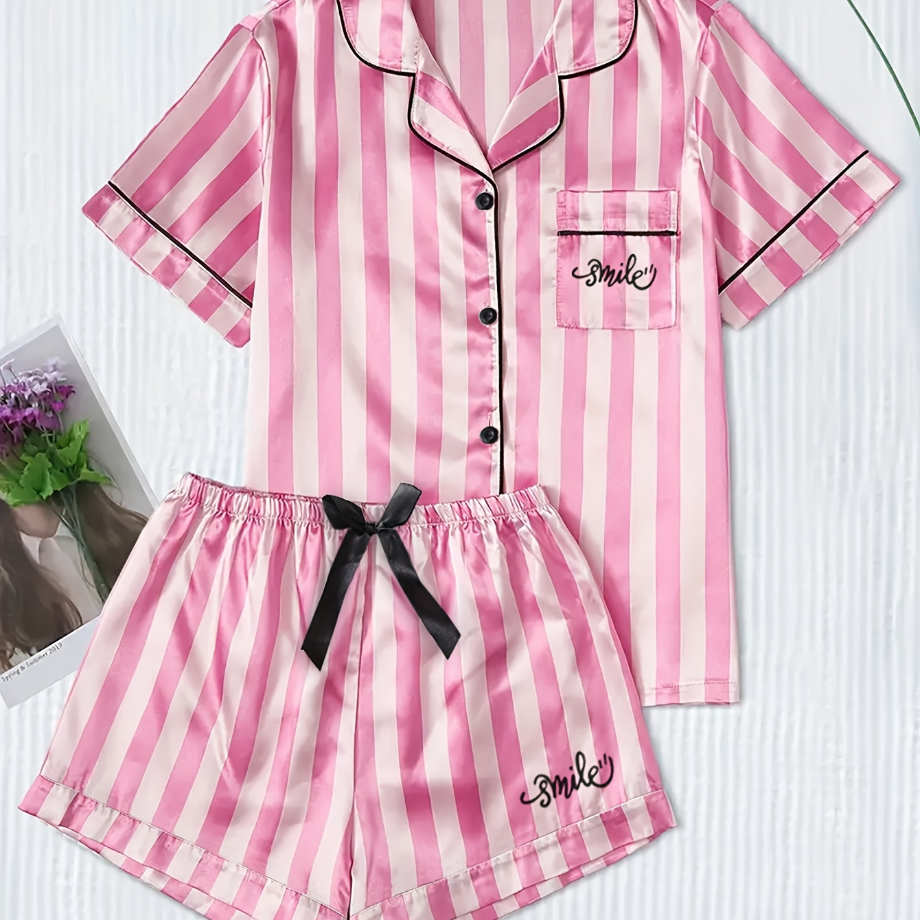 women's striped pajama set featuring a short sleeve button Temu