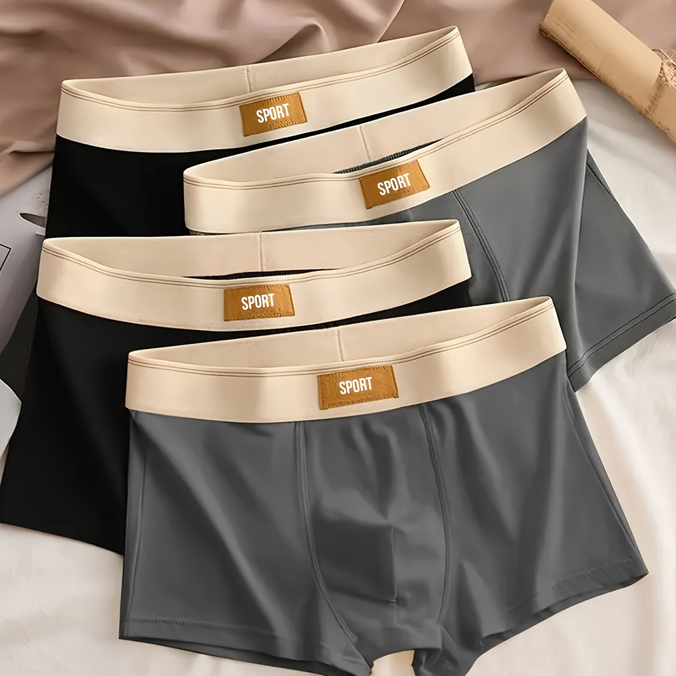 

4-Pack de boxers confortables et respirants pour hommes, sous-vêtements courts de couleur unie décontractés avec un tissu tricoté en polyester et élasthanne extensible moyen, ceinture sport