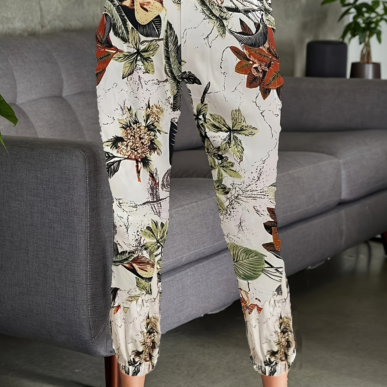 

Plus Size Casual Pants, Women's Plus Floral Print Elastic High Rise Slight Stretch Tapered Leg Trousers