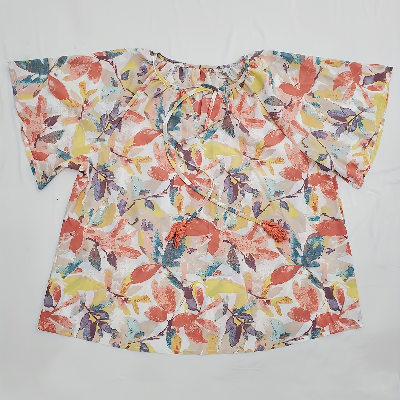 

Blouse froncée à imprimé floral grande taille, Blouse décontractée à col noué et manches courtes pour l'été, Vêtements grande taille pour femmes