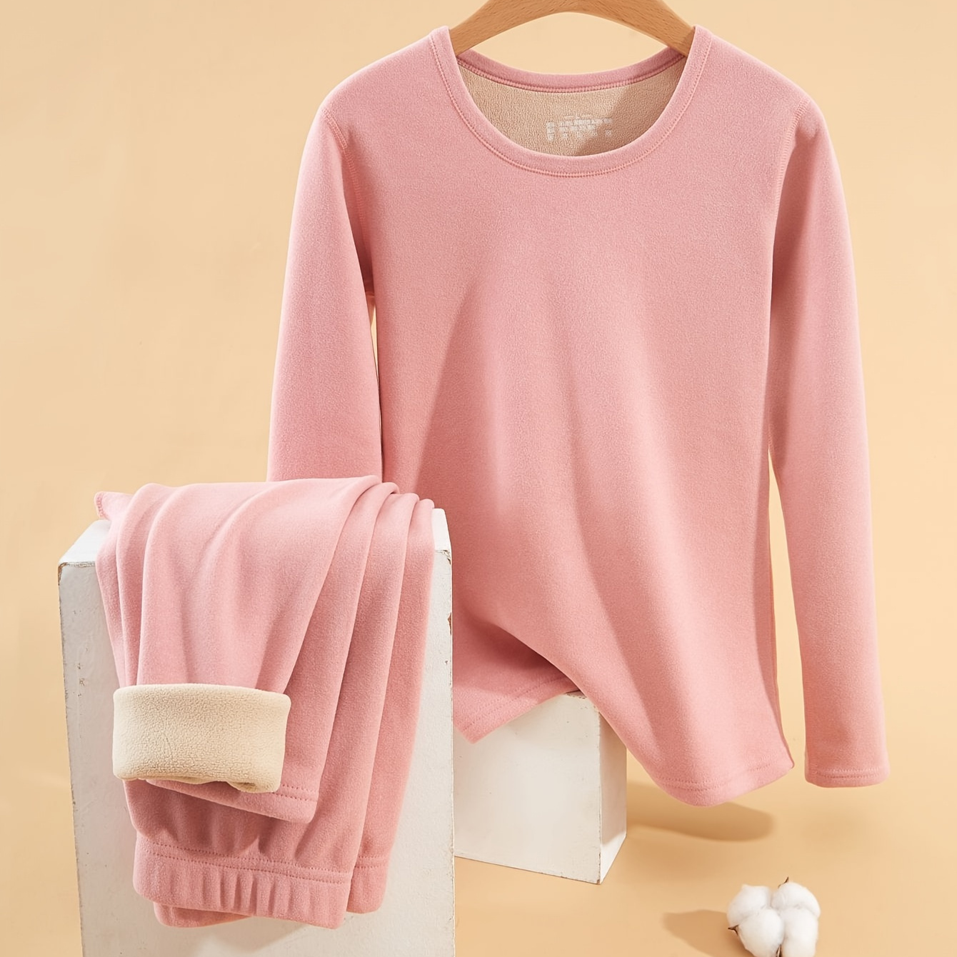 

Women's Winter Thermal Underwear Set With Fleece , Featuring A Close-fitting Round Neck Top And Pants Made From Alpaca .