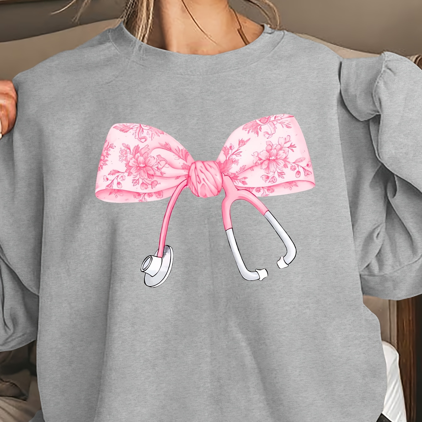 

Women's Plus Size Pink Nurse Stethoscope Bow Print Sweatshirt, Casual Crew Neck Polyester Pullovers, Slight Stretch Knit Fabric, 220g/m², Fall/