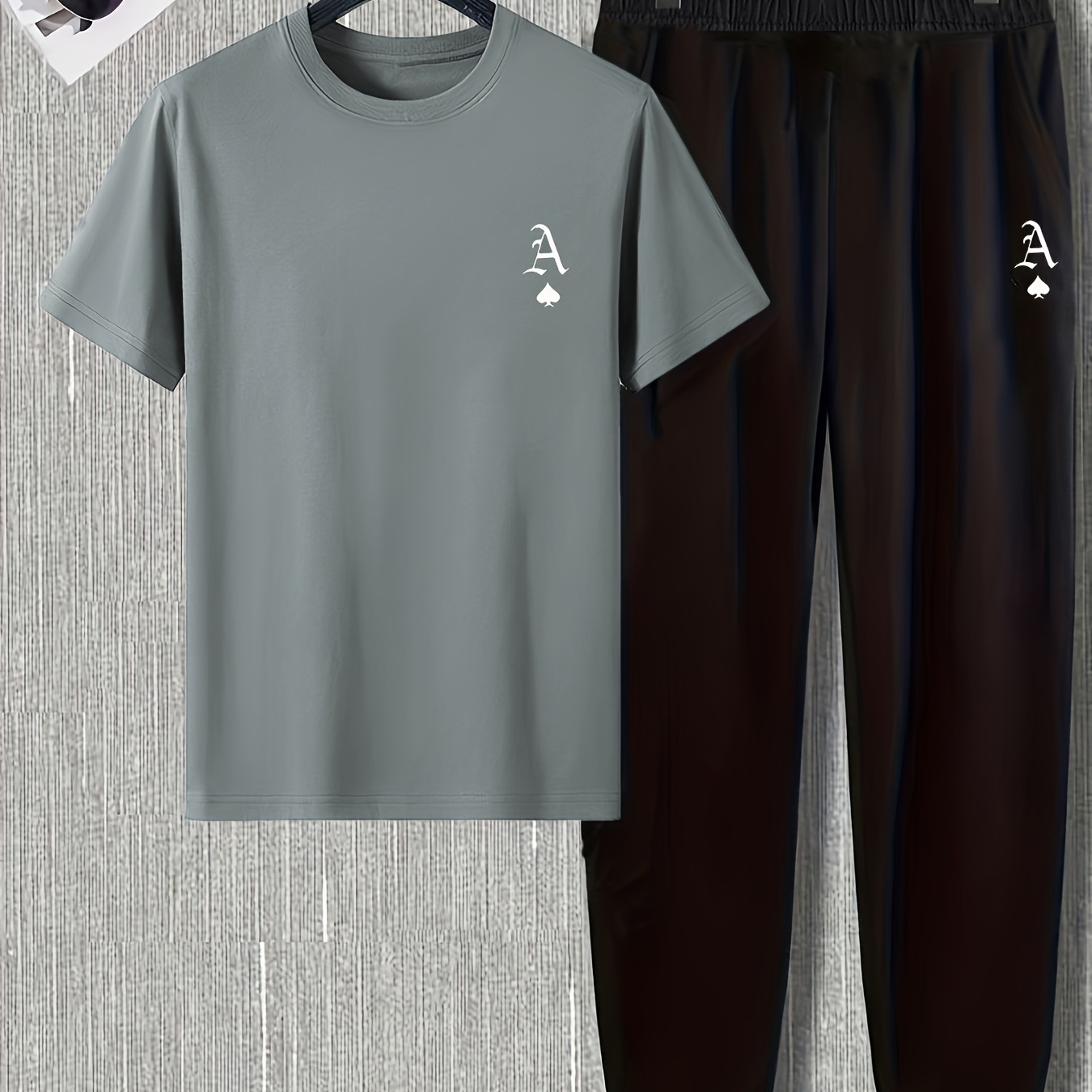 

Ensemble T-shirt et pantalon décontracté pour homme, tissu tricoté printemps/automne, couleur unie, mélange de polyester, col rond, manches courtes, ensemble pyjama coupe standard.