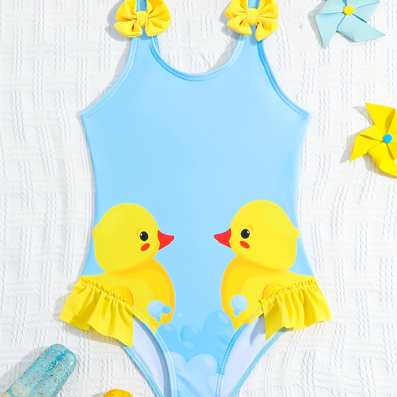 

Toddler & Baby Girl Cartoon Duck Graphic Bow Front Ruffle Trim One-piece Swimsuit