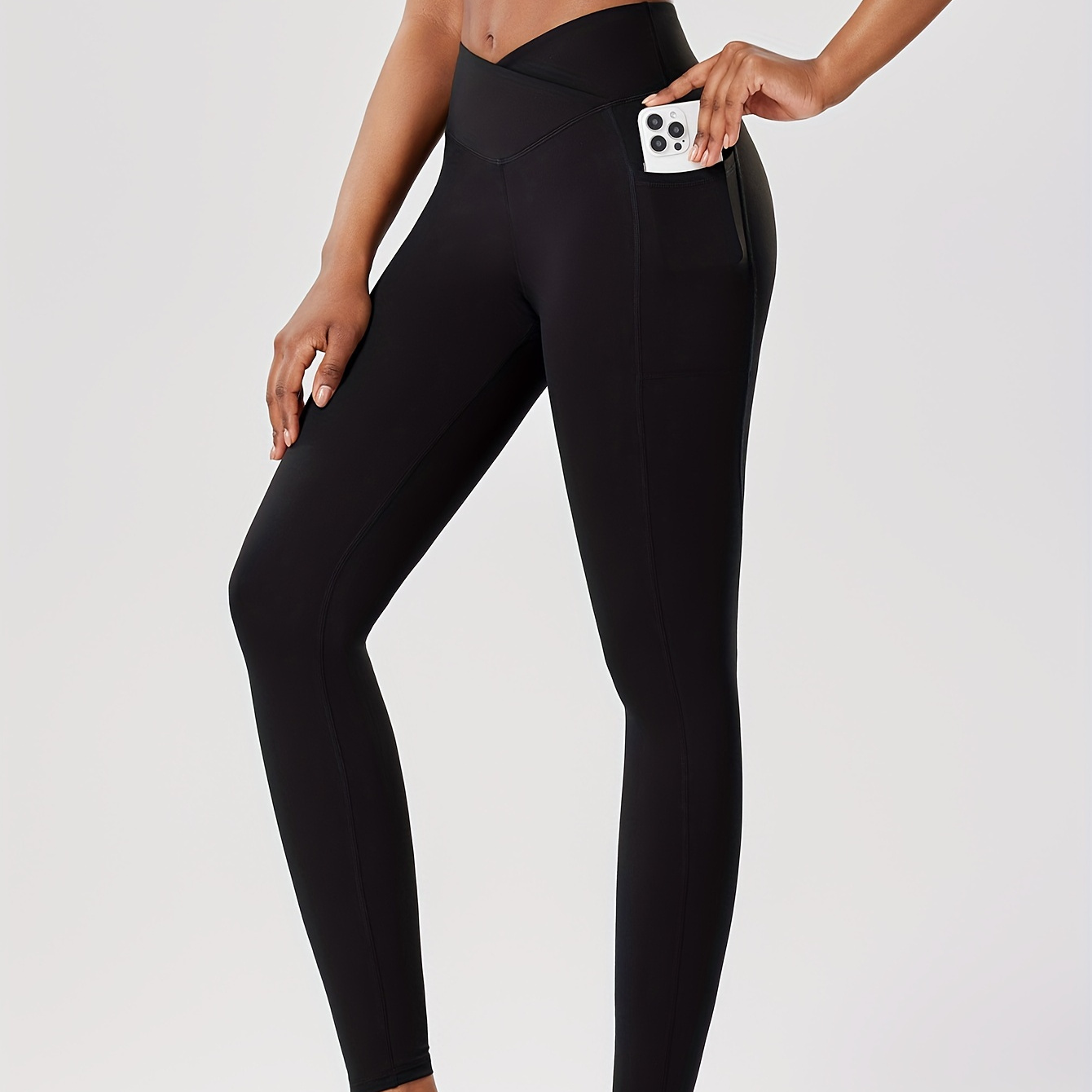 

Pantalon de yoga taille haute pour femmes avec du ventre et poches latérales, tissu en polyester 87% et élasthanne 13%, couleur unie, leggings de pour le cyclisme, le yoga, toutes les .