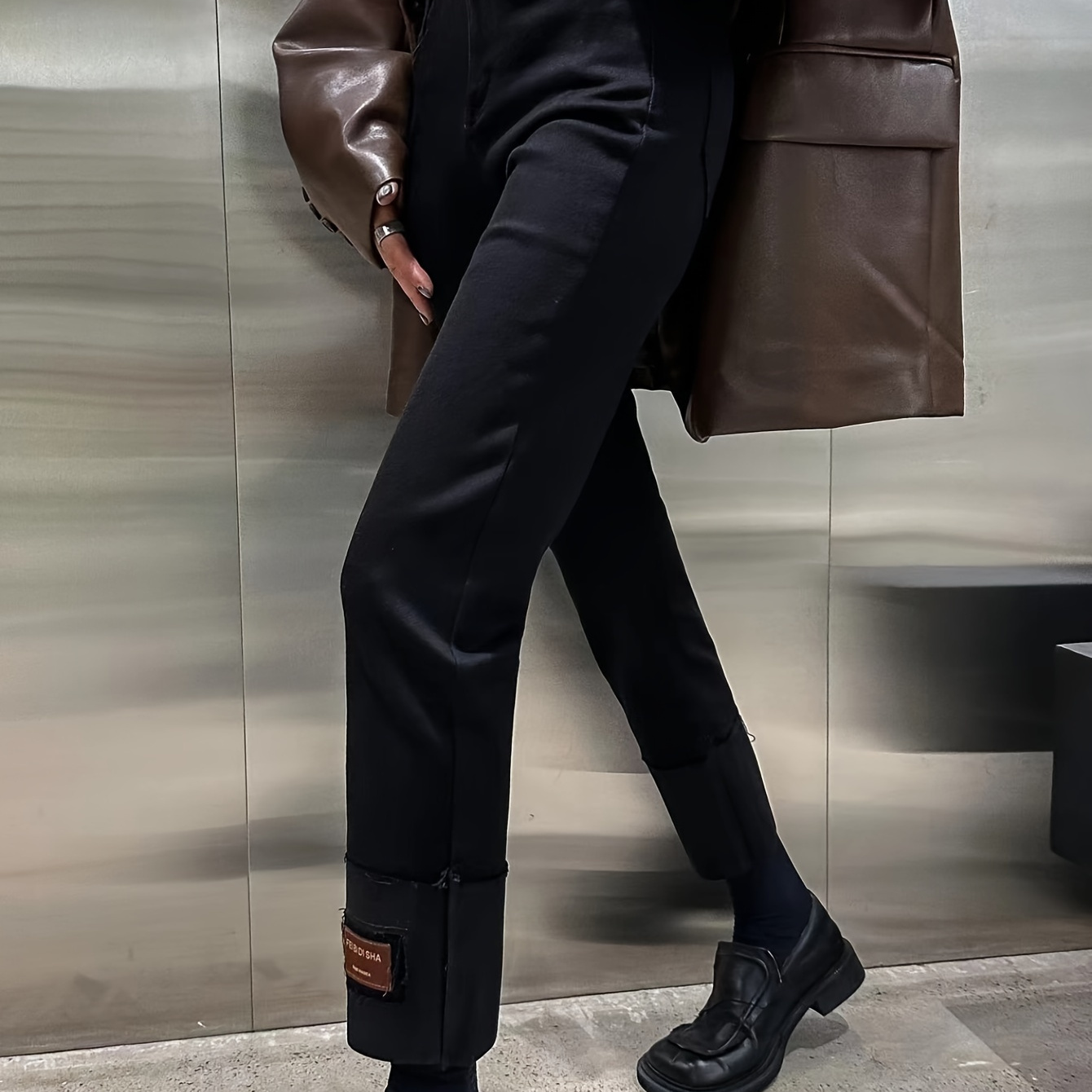 Los jeans rectos y de cintura alta de Louis Vuitton también serán tendencia