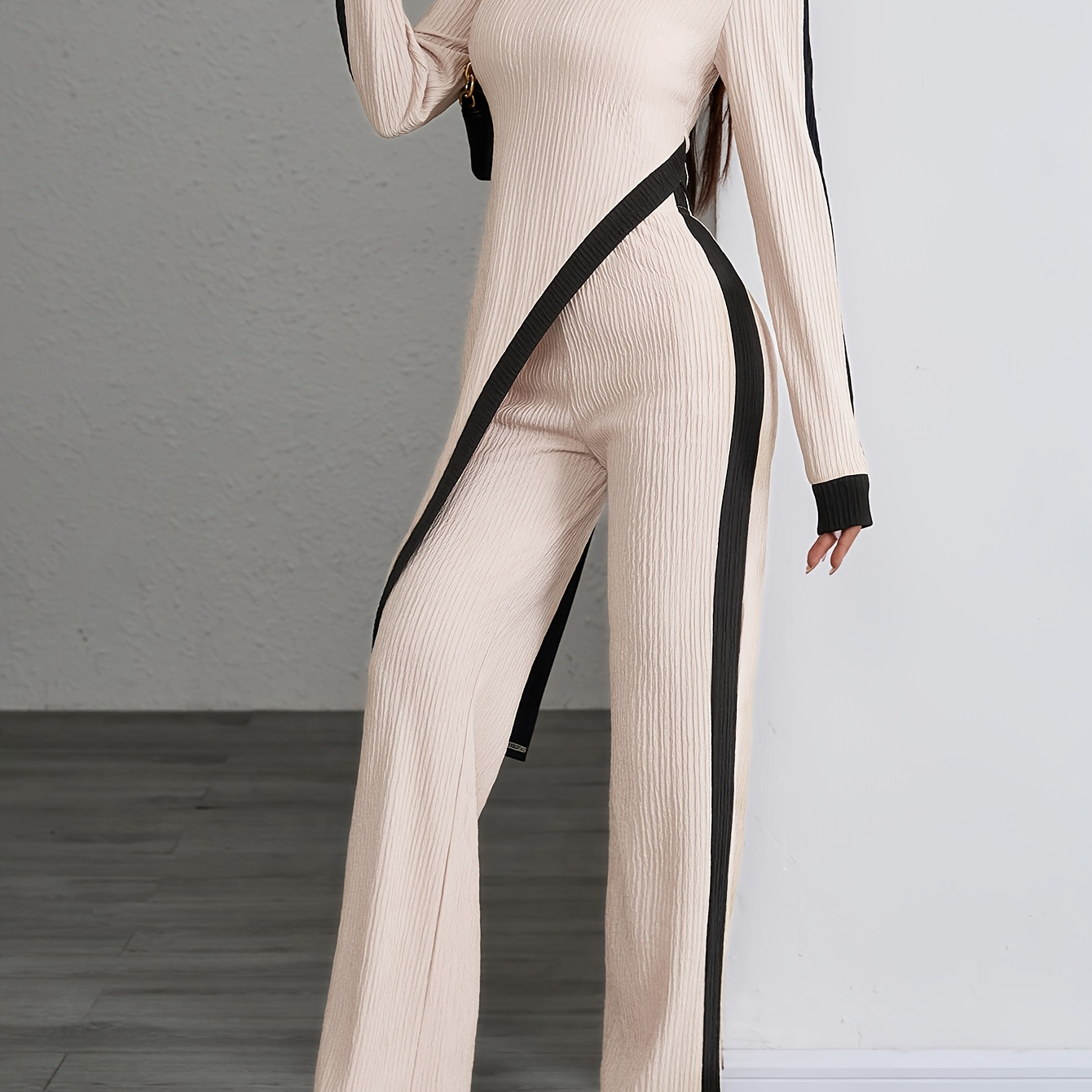 

Women's Suit Featuring A Long-sleeve Color- Top And Wide-leg Pants, An Elegant Two-piece Set With A Solid Color Asymmetrical Top And Straight-leg Trousers.