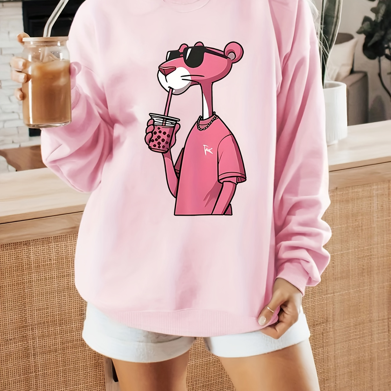 

Women's Casual Long-sleeve Sweatshirt Featuring A Cartoon Pink With A Round Neck.