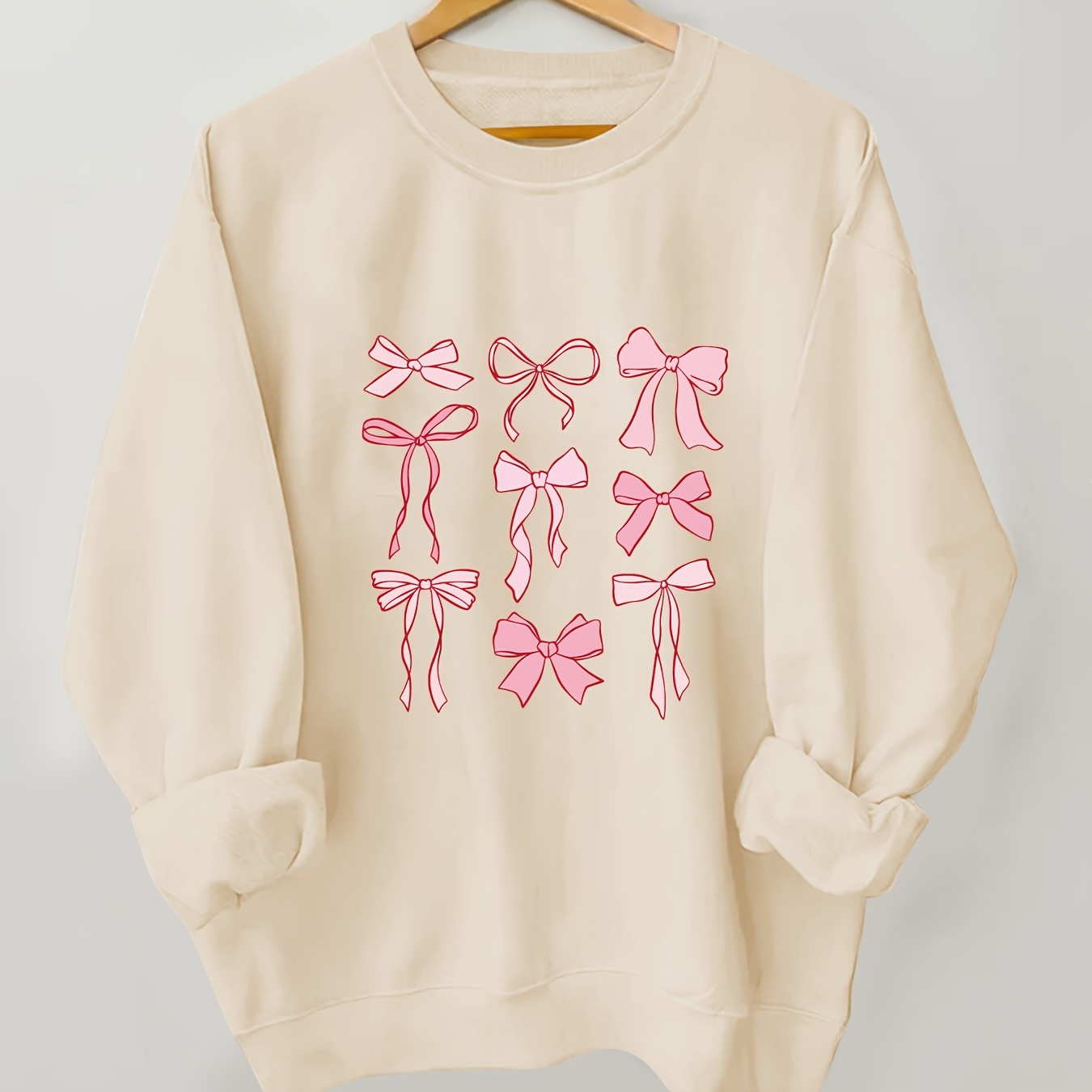 

Elegant Cartoon Bow Print Sweatshirt For Women - Polyester Knit Fabric, Round Neck, Long Sleeve Casual Hoodie