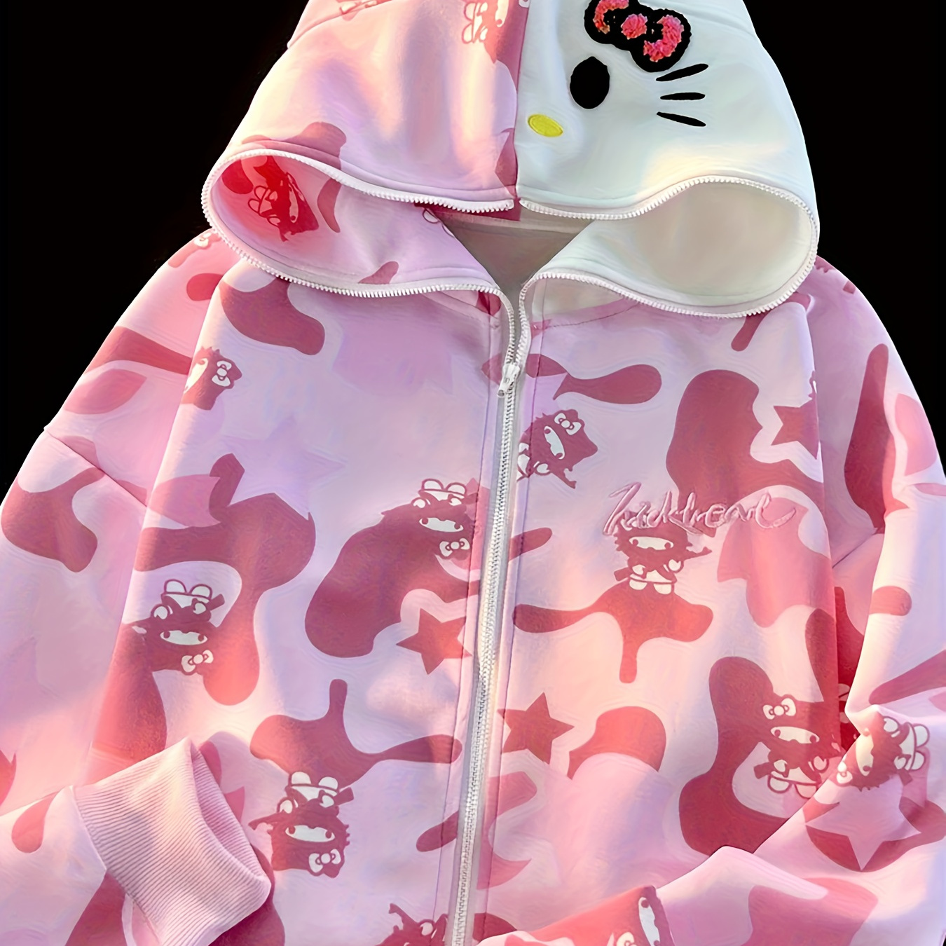 Sanrio Women's Full Zip-Up Hoodie - Pastel Pink & Camo, Hello Kitty Face, Front Zipper Closure, Loose Fit Outerwear for Autumn/Winter, Machine Washable Sanrio Collection, Autumn Fashion, Trendy Streetwear, Durable Stitching, Embroidered Details, Casual Wearers