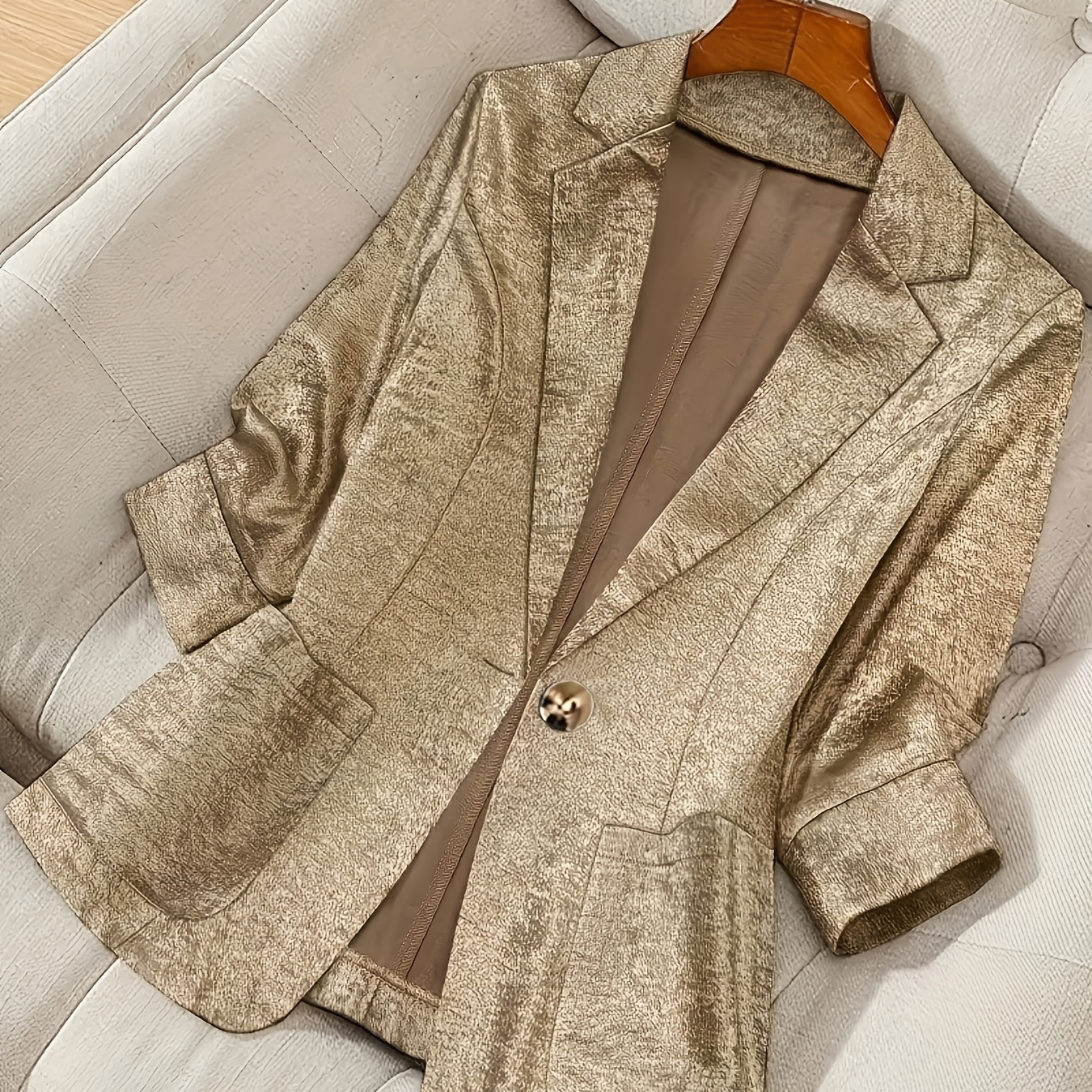 

An Elegant Women's Blazer With A Single-button Front, Regular Fit, -quarter Sleeves, Unlined, Solid Color Jacket With Pockets.