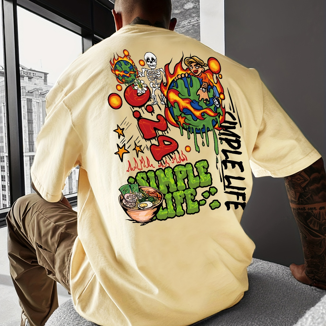 

T-shirt à col rond et manches courtes pour homme avec motif Cartoon Planet et lettres, idéal pour l'été et les activités en extérieur.