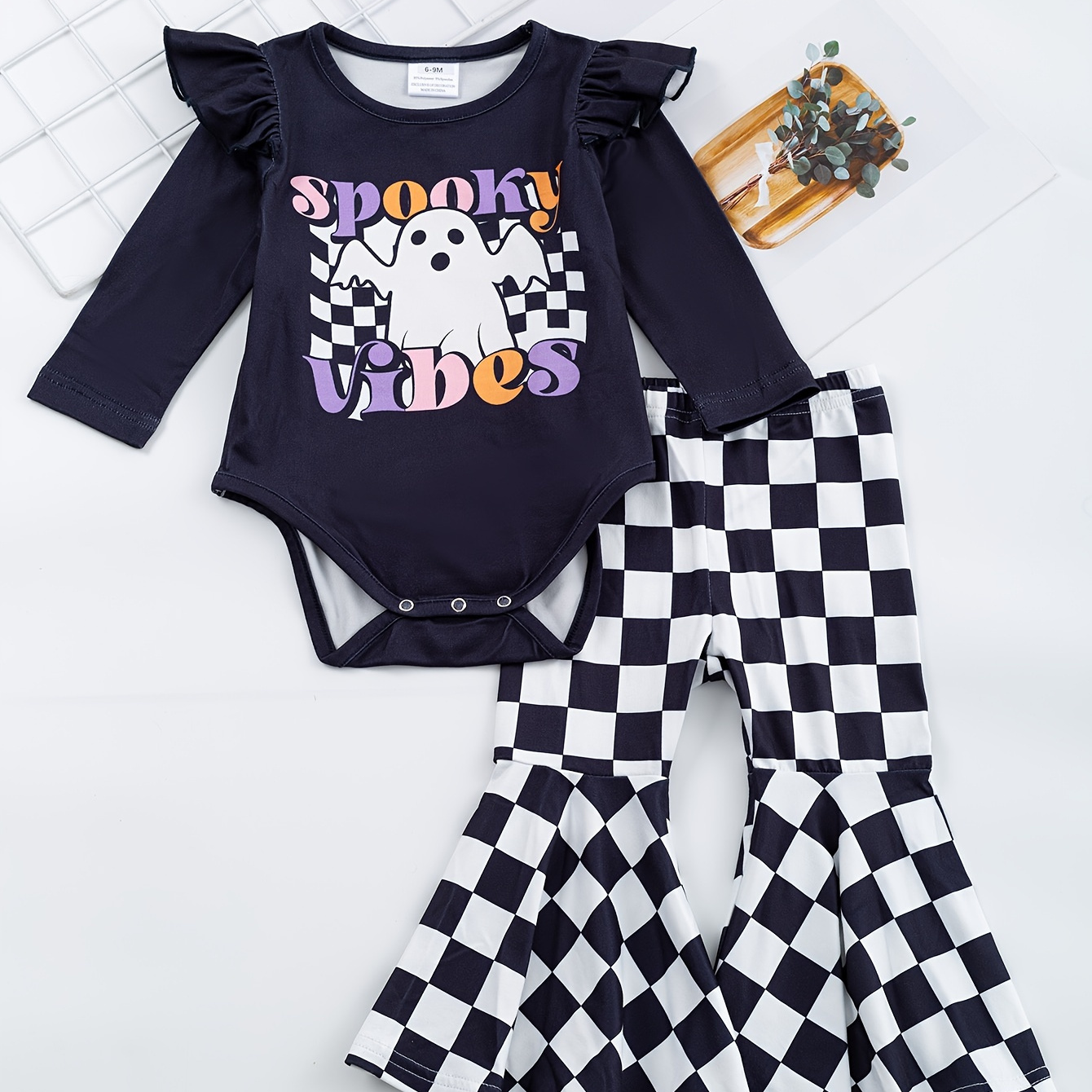

Halloween Baby Girls Ruffle Cartoon Ghost Print Long Sleeve Romper & Checkerboard Print Flared Pants Set