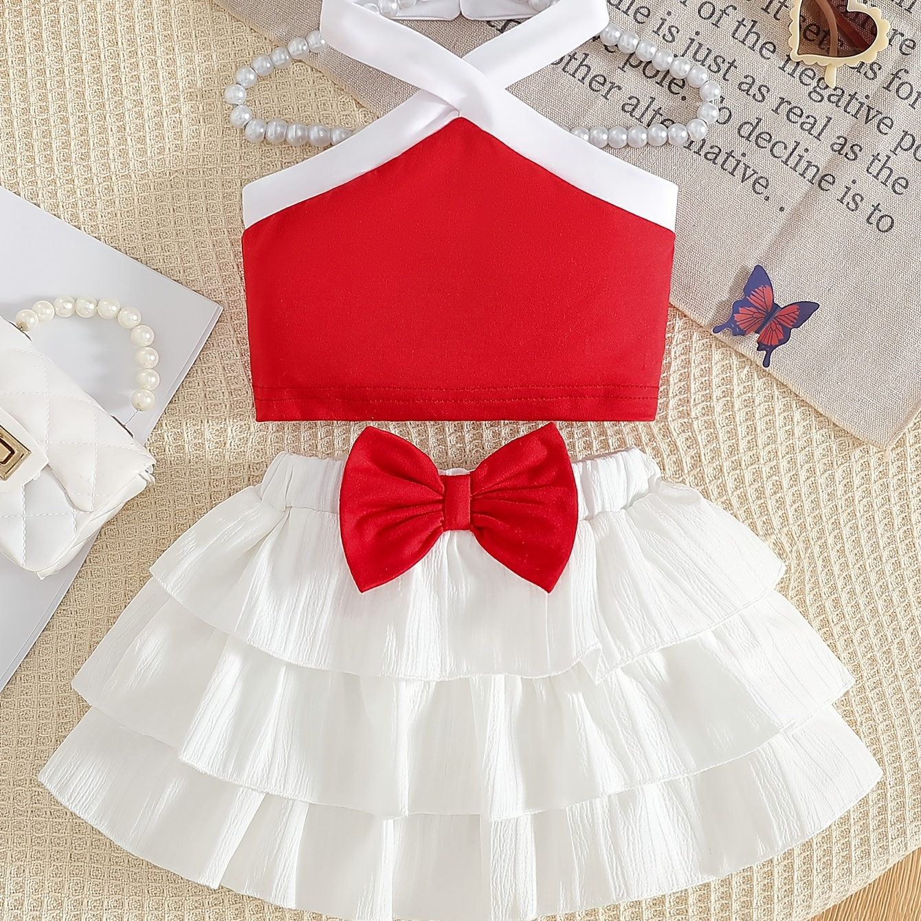 

This Outfit Set For Baby Girls Features A Solid Color Sleeveless Top With A Bow And A Cute Cake Skirt, (the Length Of The Top Is From The ), For Outdoor