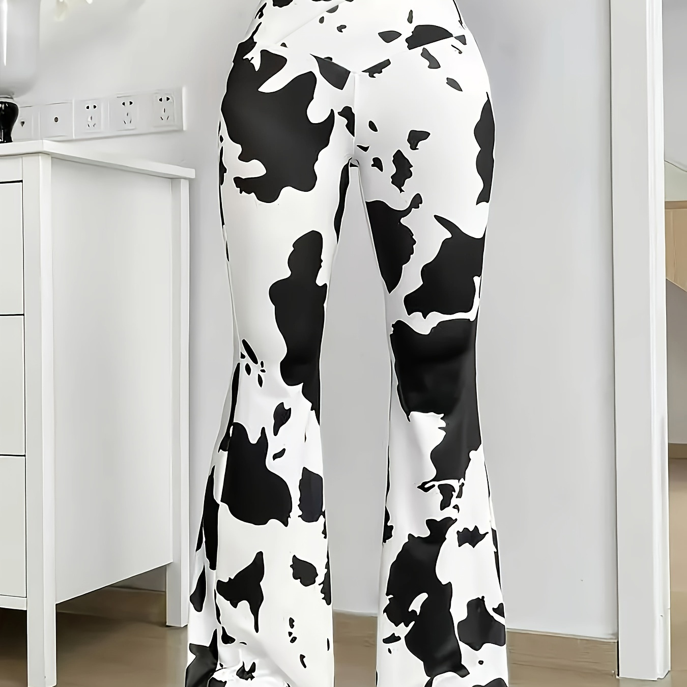 

Chic Cow Print Flare Pants For Women - Stretchy, Comfortable & Elegant Casual Attire