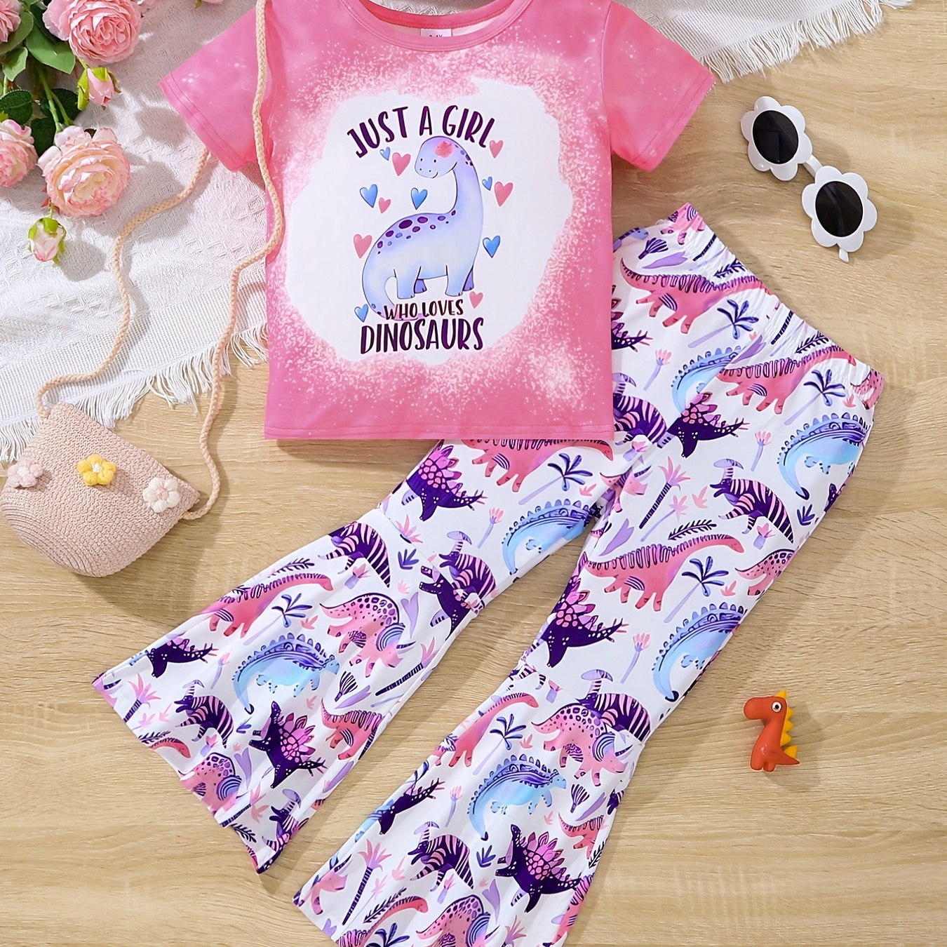 

2pcs Toddler Girls Dinosaur Graphic T-shirt Round Neck Tee Tops & Elastic Waist Flare Leg Pants Set Kids Spring Summer Clothes