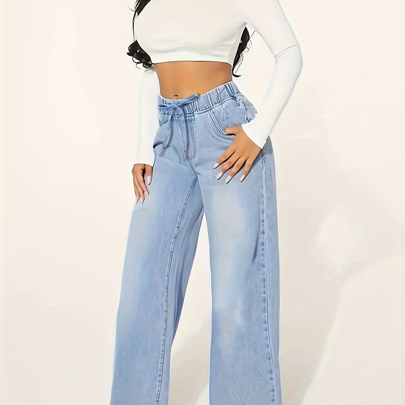 

Plus Size Jeans taille élastique à cordon de serrage, coupe , bleu délavé uni, pour femmes.