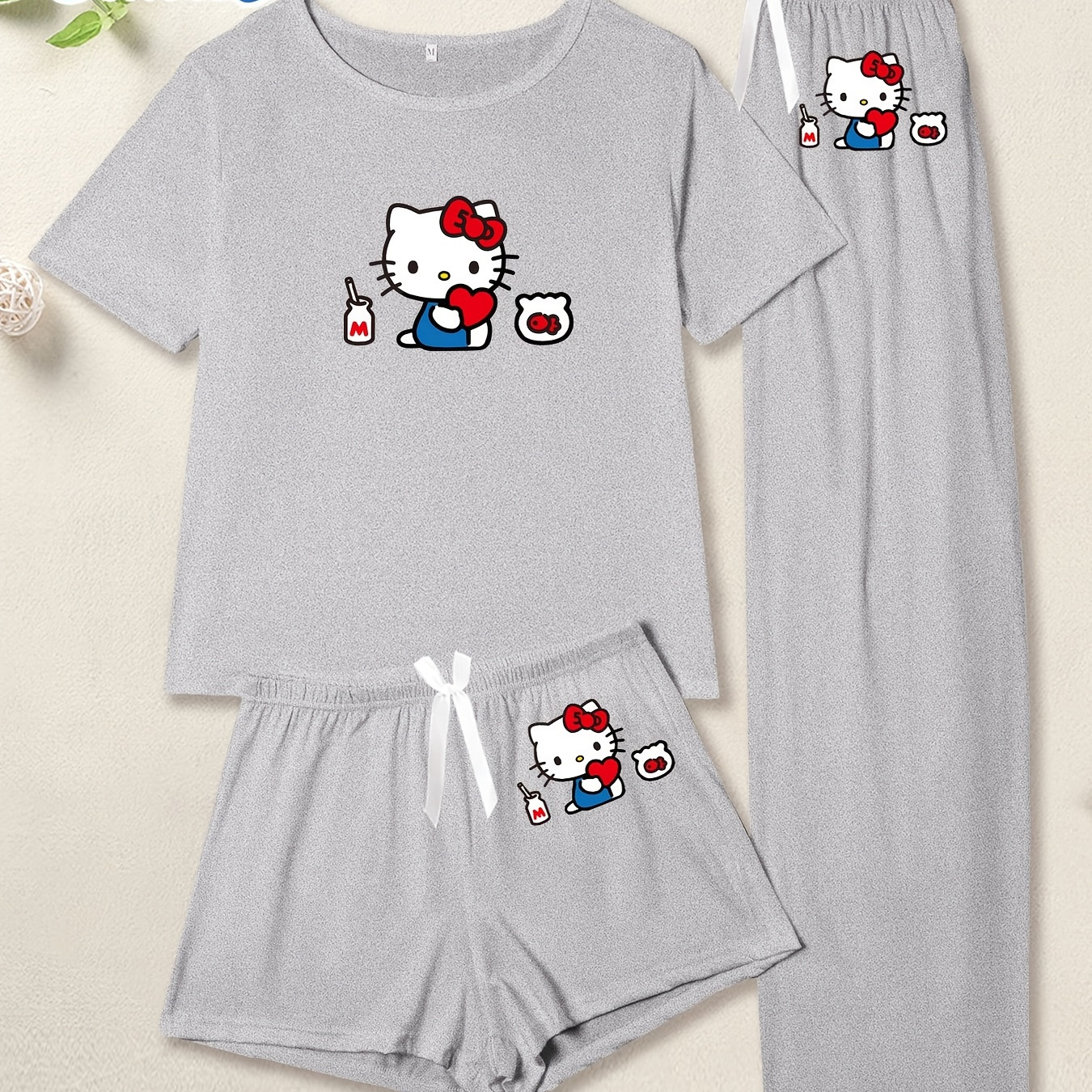 

Le set de pièces décontracté et confortable Hello Kitty de Sanrio des shorts, une t-shirt à manches courtes et des pantalons , pour et l'été.